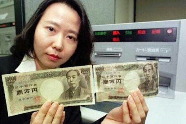 [Фото дня] Японські банкомати перед видачею готівки дезинфікують її